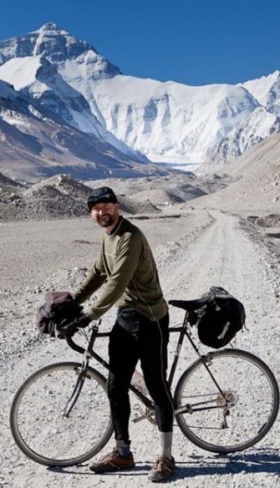 Tom Gardner Cycling on the  tour with redspokes